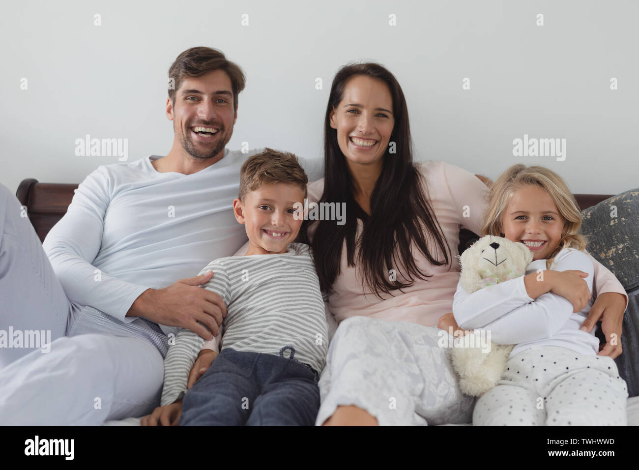 Familie sitzen zusammen auf dem Sofa im Wohnzimmer art Home Stockfoto