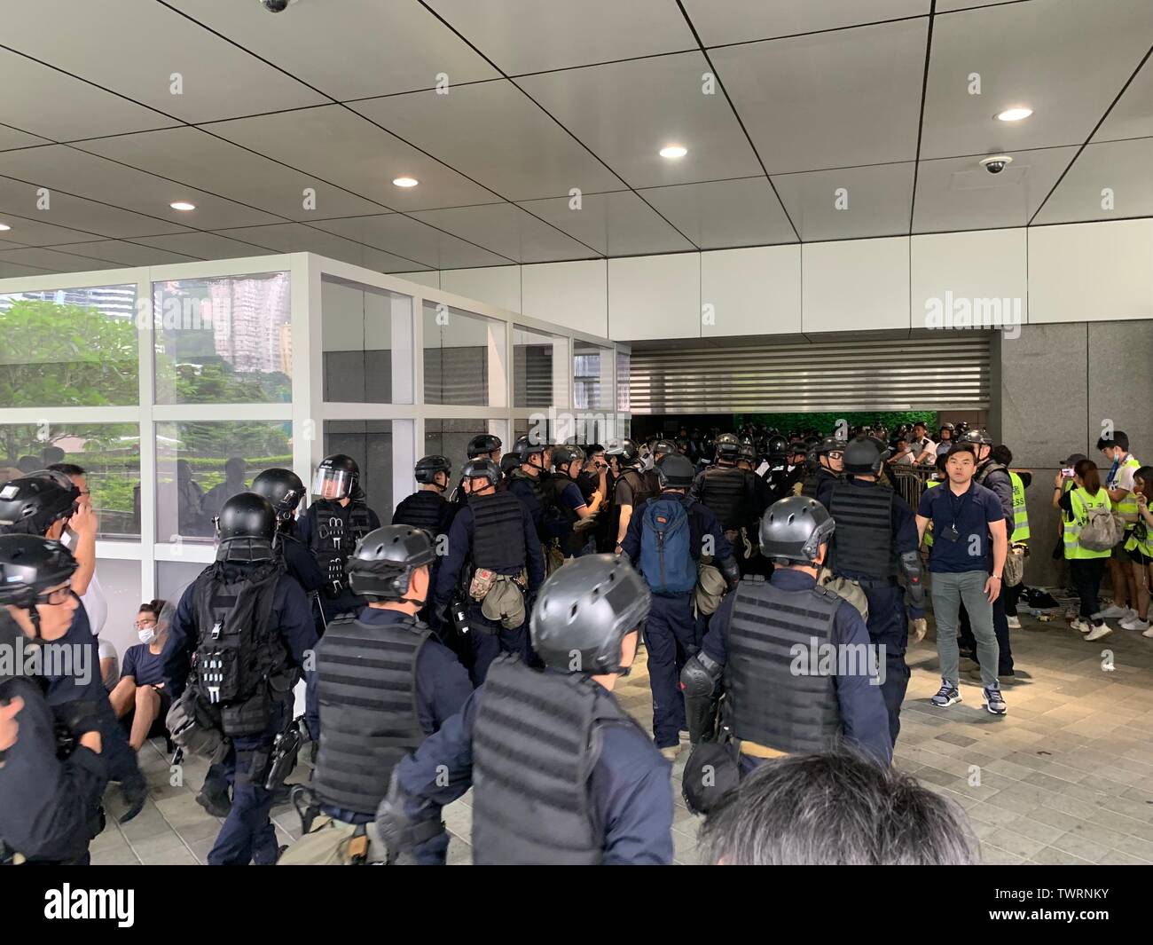 Hong Kong-12 Juni 2019: Special Tactical Squad so genannte raptors oder Elite Team, bereiten in den Protest. Nachdem die Demonstranten nahmen bis Juni 9 Stockfoto