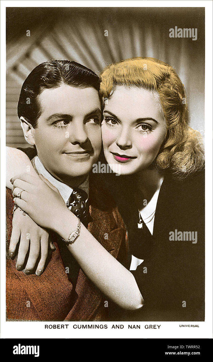 Hand - farbige Postkarte von Schauspieler Robert Cummings und Schauspielerin Nan Grau. Stockfoto