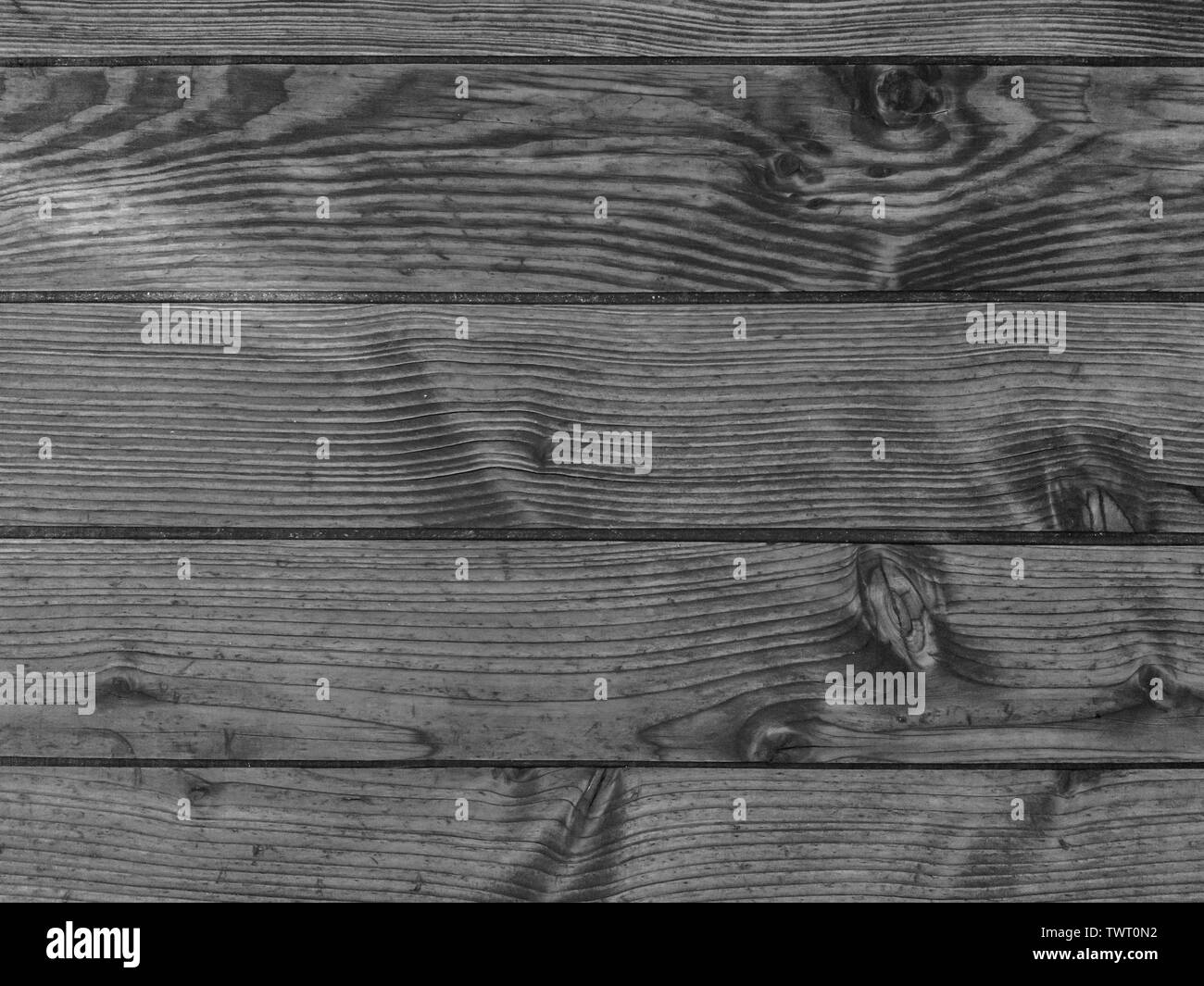 Schwarz-weiß Foto eines alten Holz Kiefer deck. Textur aus Holz. Stockfoto
