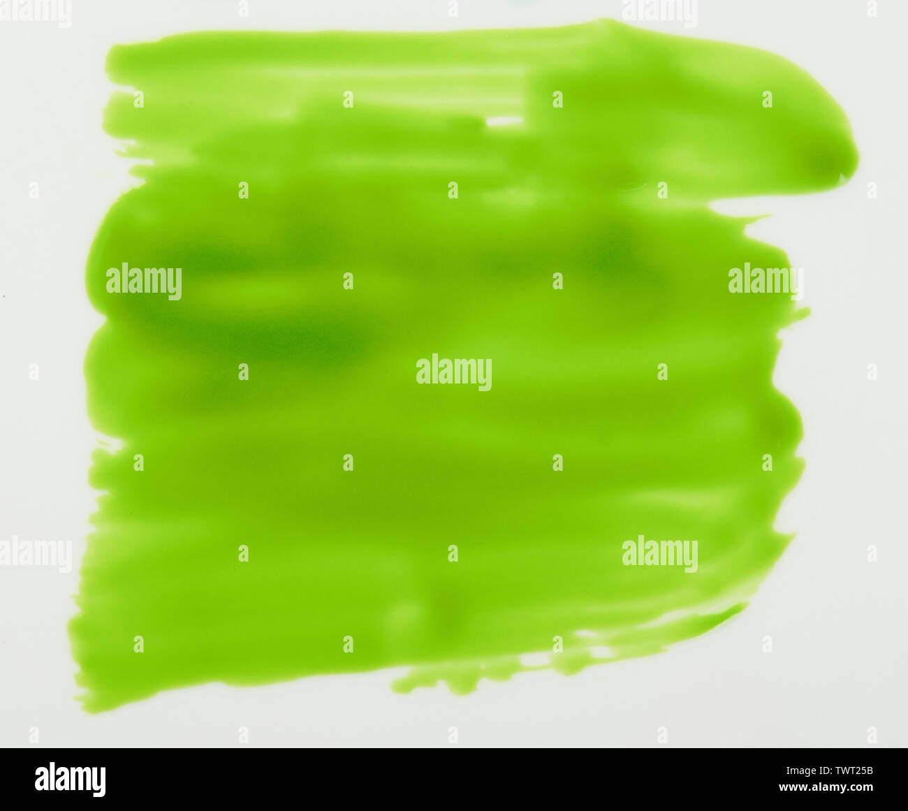 Hellgrüne Farbe Fleck auf weissem Hintergrund Nahaufnahme isoliert Stockfoto