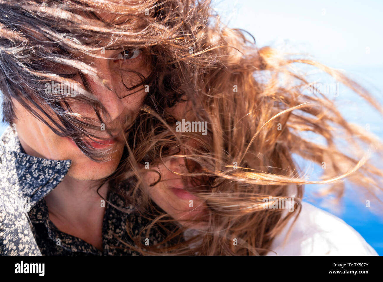 Seychellen, Indischer Ozean, reifes Paar mit windswept Haar, close-up Stockfoto