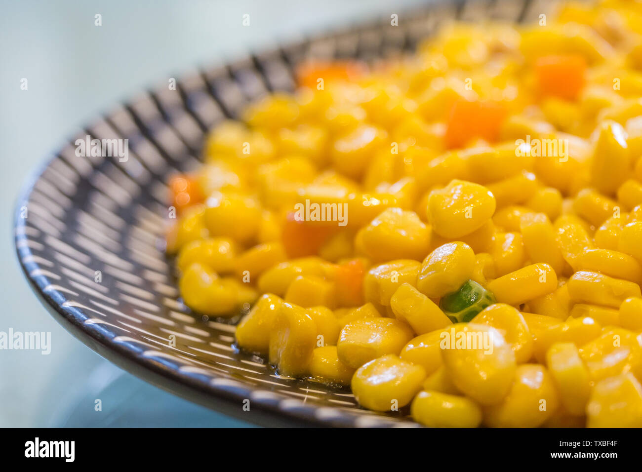 Nahaufnahme einer Platte der chinesischen Küche Kiefer kernel Mais Stockfoto