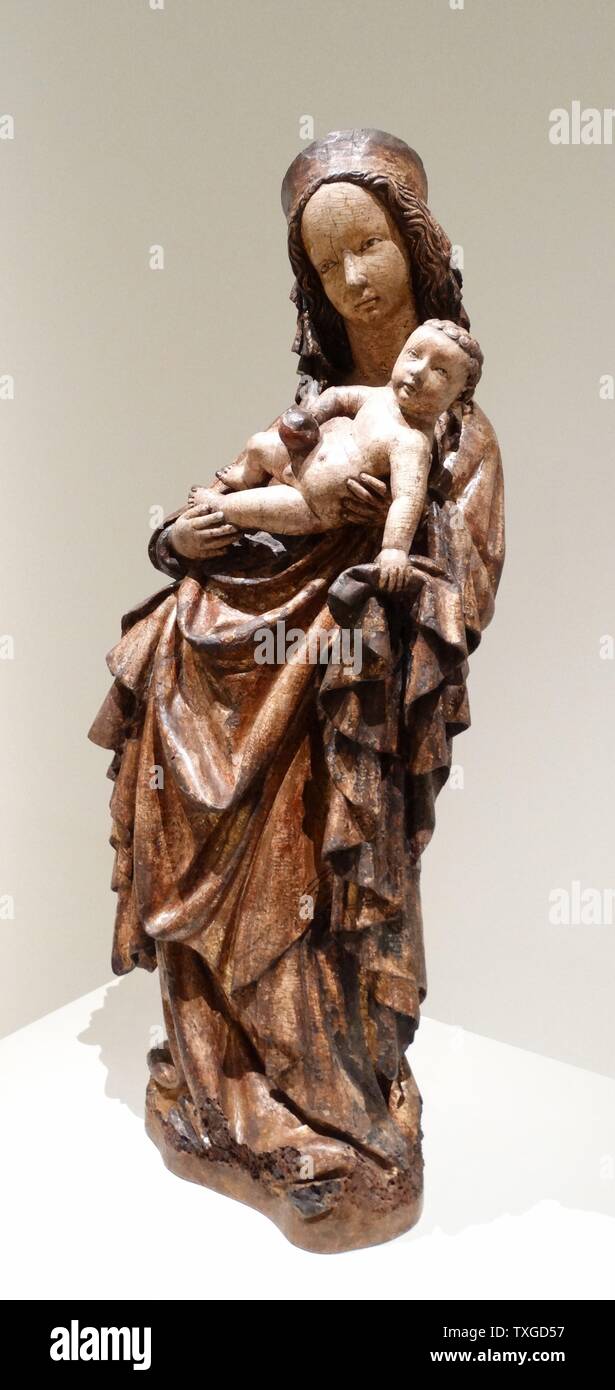 Statuette der Madonna mit Kind von anonym. Geschnitzt aus Holz und mit Blattgold vergoldet. Vom 15. Jahrhundert Stockfoto