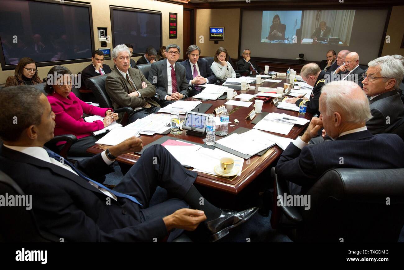 Präsident Obama vermitteln ein National Security Council Meeting in den Situation Room des weißen Hauses, Fragen in der Ukraine zu diskutieren. Datierte 2014 Stockfoto