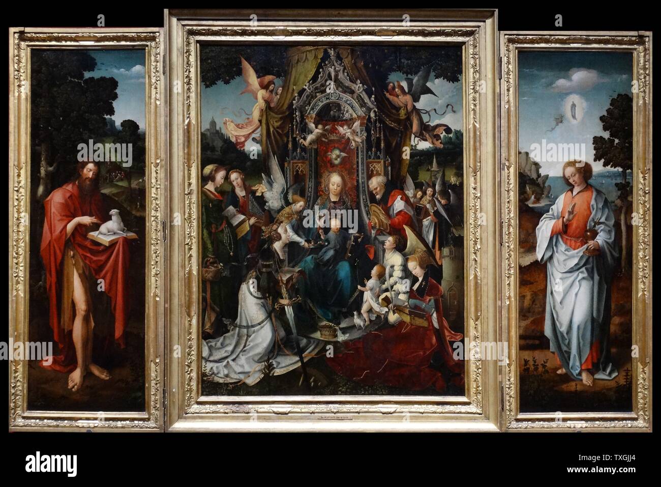 Gemälde mit dem Titel "Die Jungfrau und Kind inthronisiert mit Heiligen" von Jan de Beer (1470-1528) ein niederländischer Maler und Zeichner. Datiert aus dem 16. Jahrhundert Stockfoto