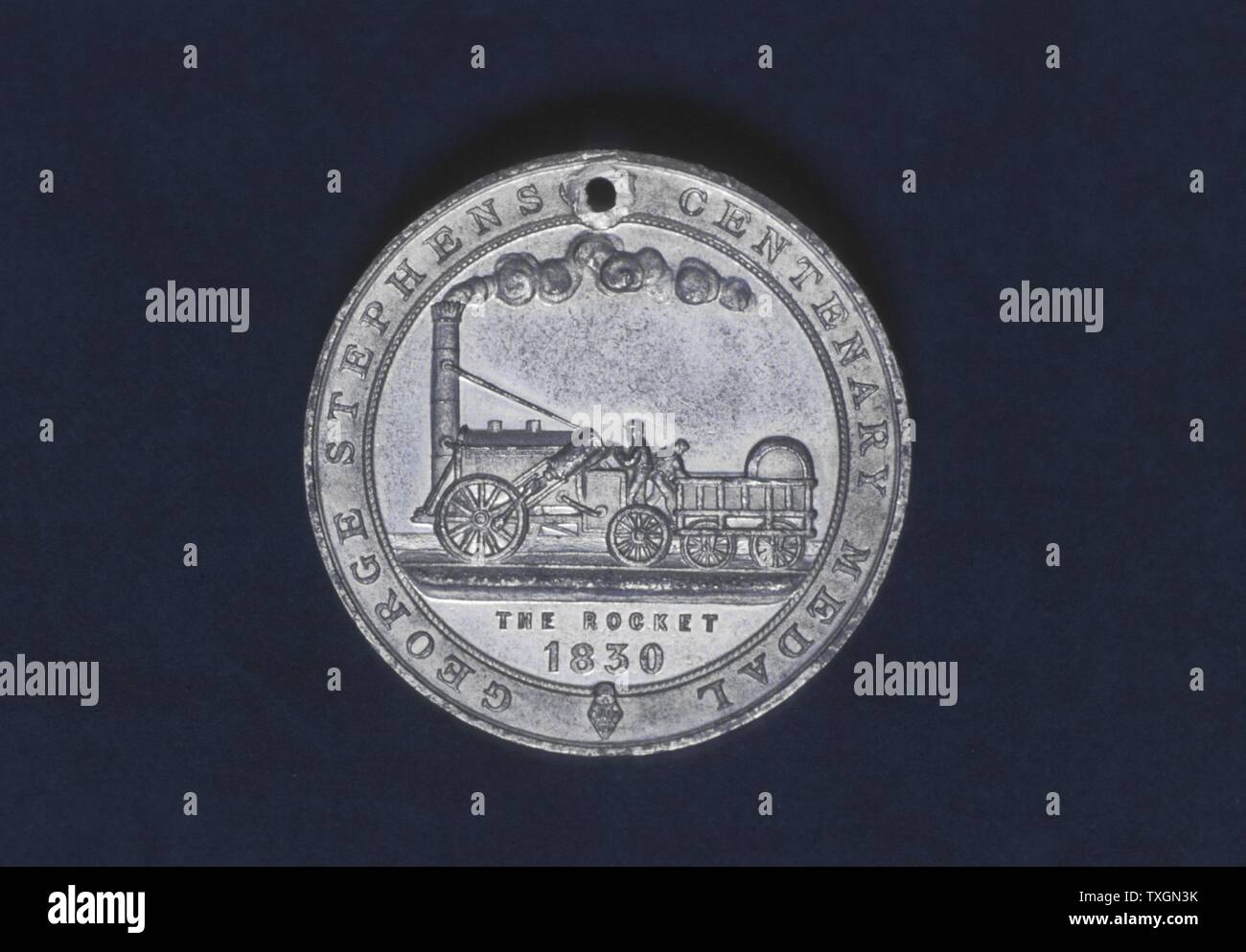 George Stephenson (1781-1848) Englischer Eisenbahningenieur. Seine Lokomotive Rakete von der Rückseite der Medaille Struck zur 100-Jahrfeier der Stephensons Geburt gedenken Stockfoto