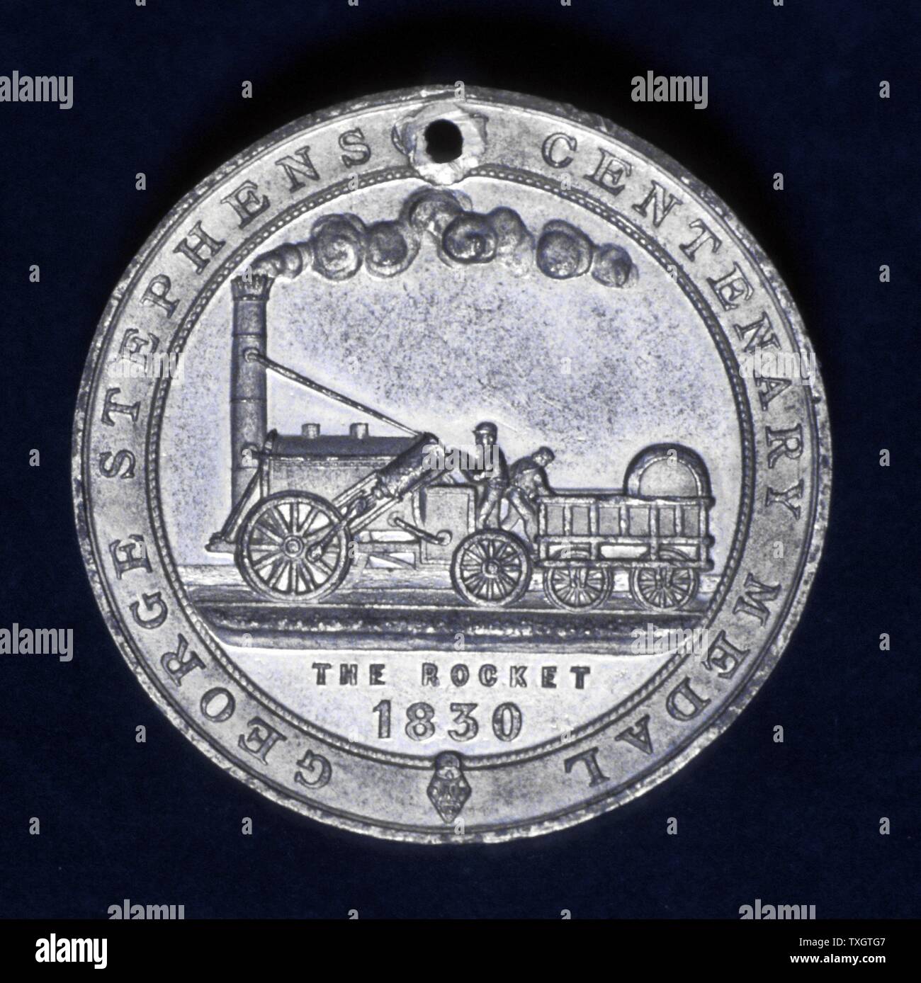 George Stephenson (1781-1848) Englischer Eisenbahningenieur. Seine Lokomotive Rakete von der Rückseite der Medaille Struck zur 100-Jahrfeier der Stephensons Geburt gedenken Stockfoto