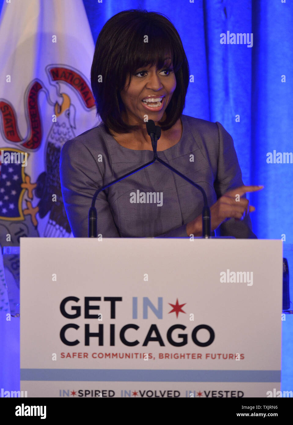 First Lady Michelle Obama spricht am Mittagessen Konferenz über die Verbesserung der Sicherheit in der Nachbarschaft in der Stadt am 10. April, 2013 in Chicago. Die Bürger und Unternehmen entwickeln einen Plan zur direkten $ 50 Millionen Privat angehoben Finanzierung über fünf Jahren zu Gewaltprävention und Intervention Programme der Gemeinschaft zum Aufbau von Kapazitäten und ein Innovationsfonds über neue Ansätze in der Gemeinschaft muss in der Adresse prüfen. UPI/Brian Kersey Stockfoto