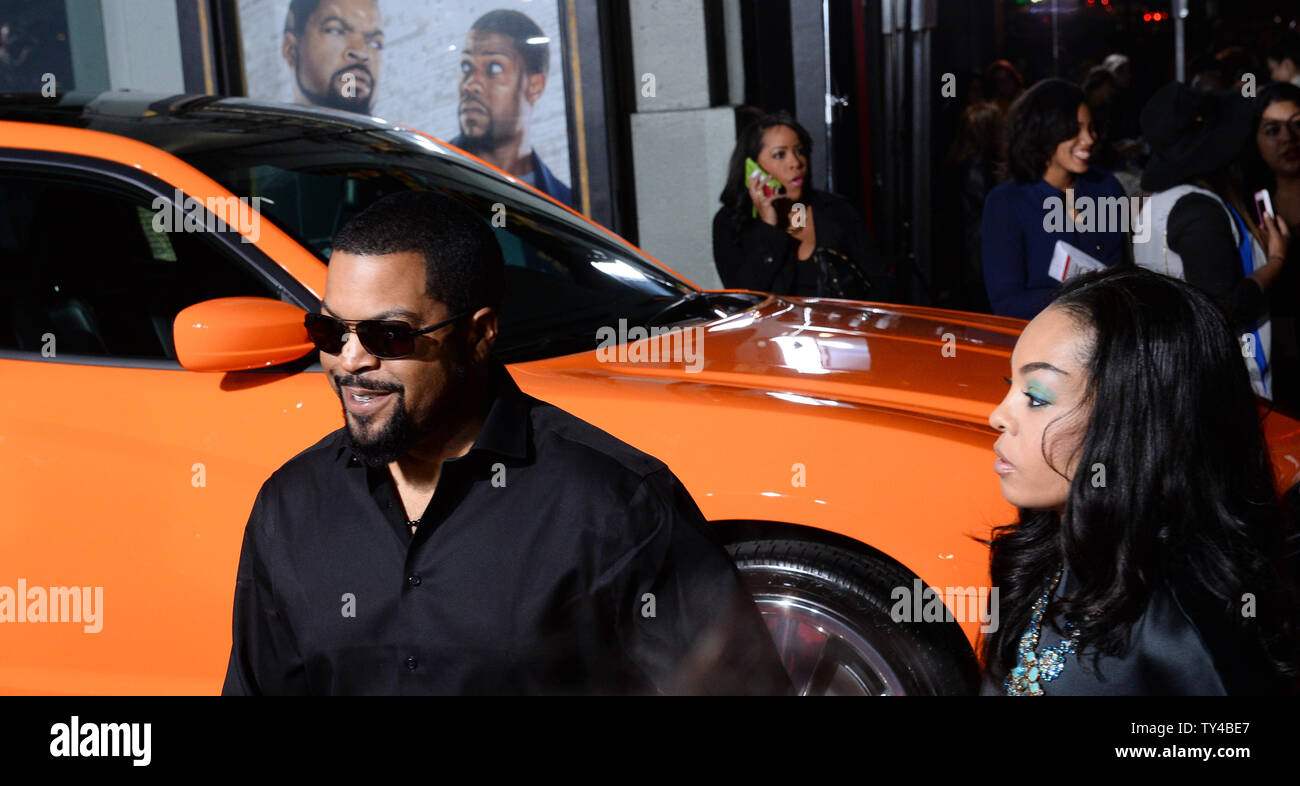 Warf Mitglied Ice Cube und seine Frau Kimberly Waldmeister Besuchen die Premiere der motion picture Komödie 'Fahren' an TCL Chinese Theatre in Hollywood" in Los Angeles am 13. Januar 2014. In dem Film, schnell sprechenden Wachmann Ben (Kevin Hart) verbindet seine cop Schwager James (Ice Cube) auf eine rund um die Uhr patrouille von Atlanta, um sich würdig zu heiraten, Angela (Tika Sumpter), James' Schwester zu beweisen. UPI/Jim Ruymen Stockfoto