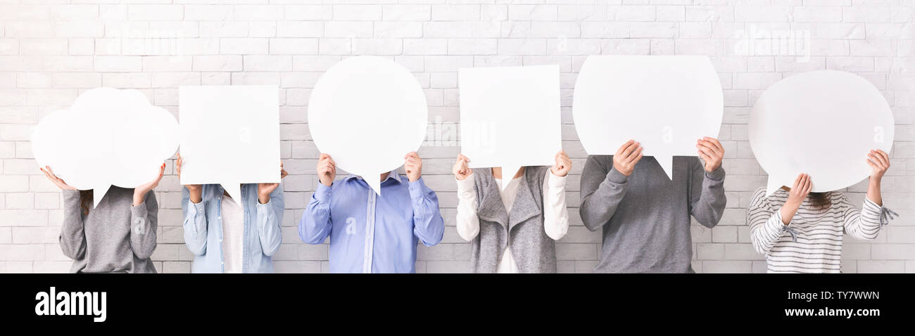 Menschen mit leeren Sprechblasen auf ihre Gesichter Stockfoto Menschen mit leeren Sprechblasen auf ihre Gesichter Stockfoto