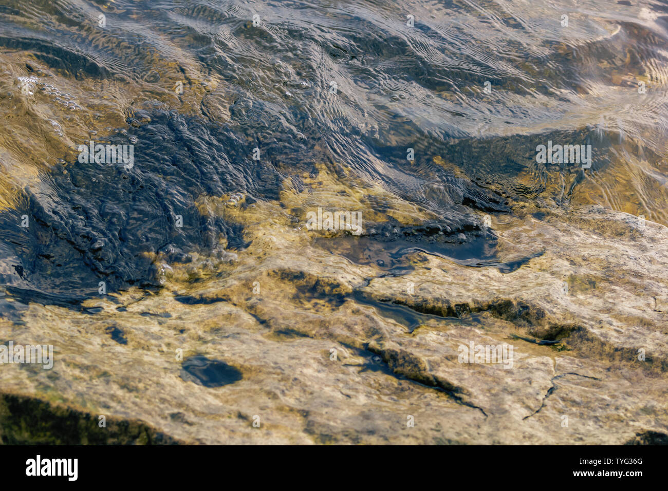 Naturstein Textur. Flusskiesel Hintergrund. Platz kopieren Stockfoto
