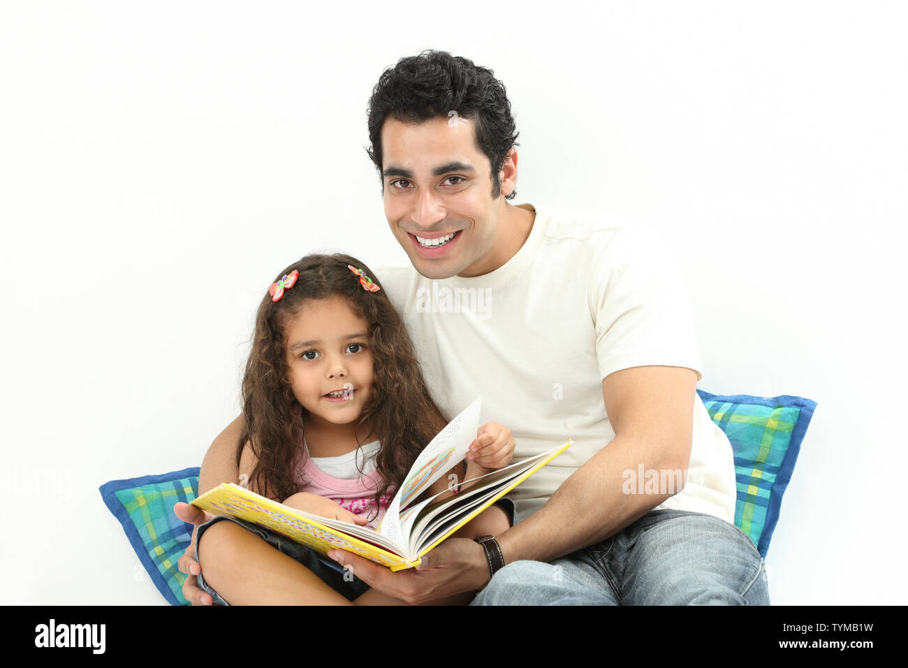 Porträt eines Mannes, der seine Tochter unterrichtet Stockfoto