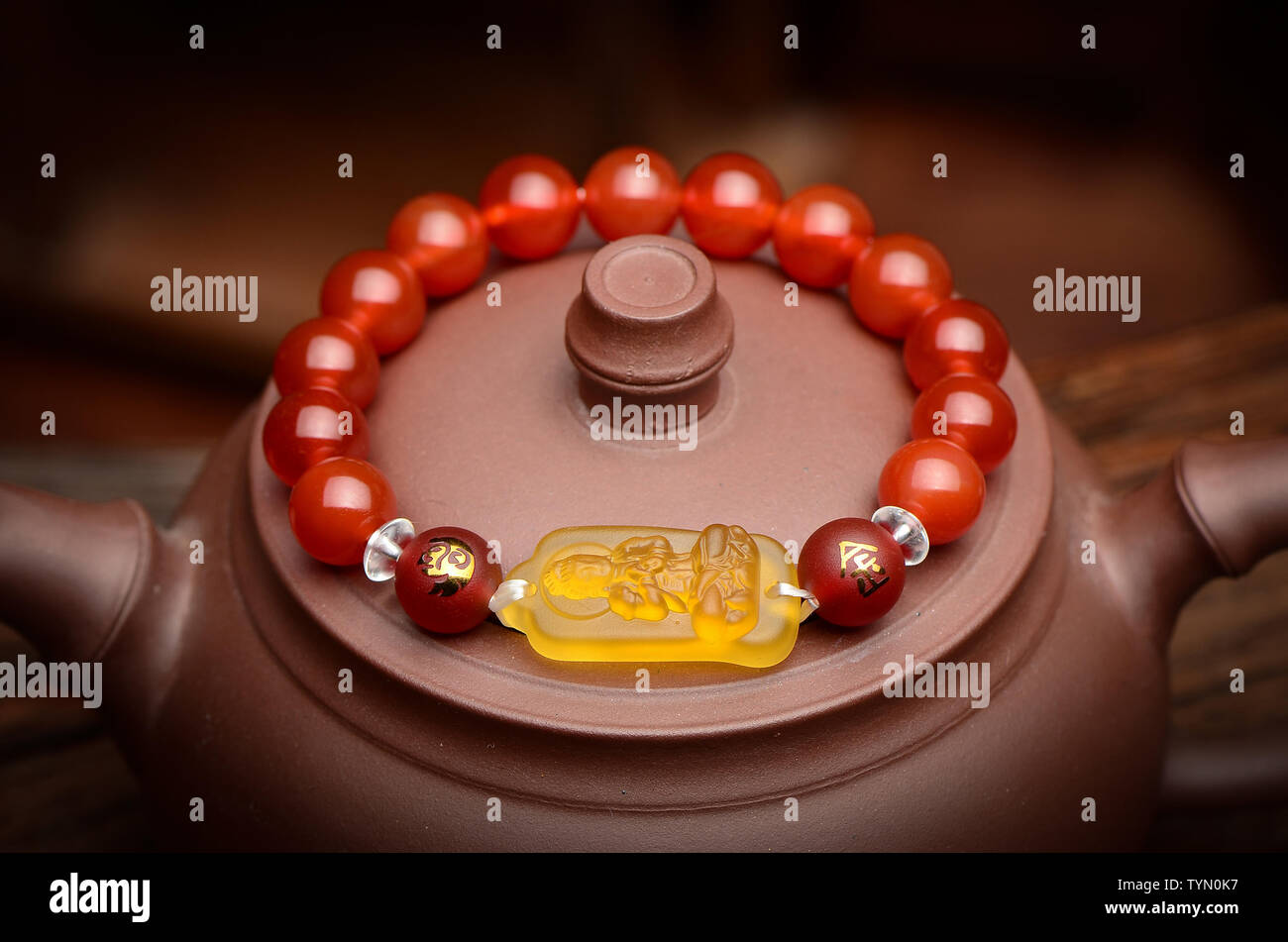 Roter Achat, Buddha, Crystal, Hand string. Stockfoto