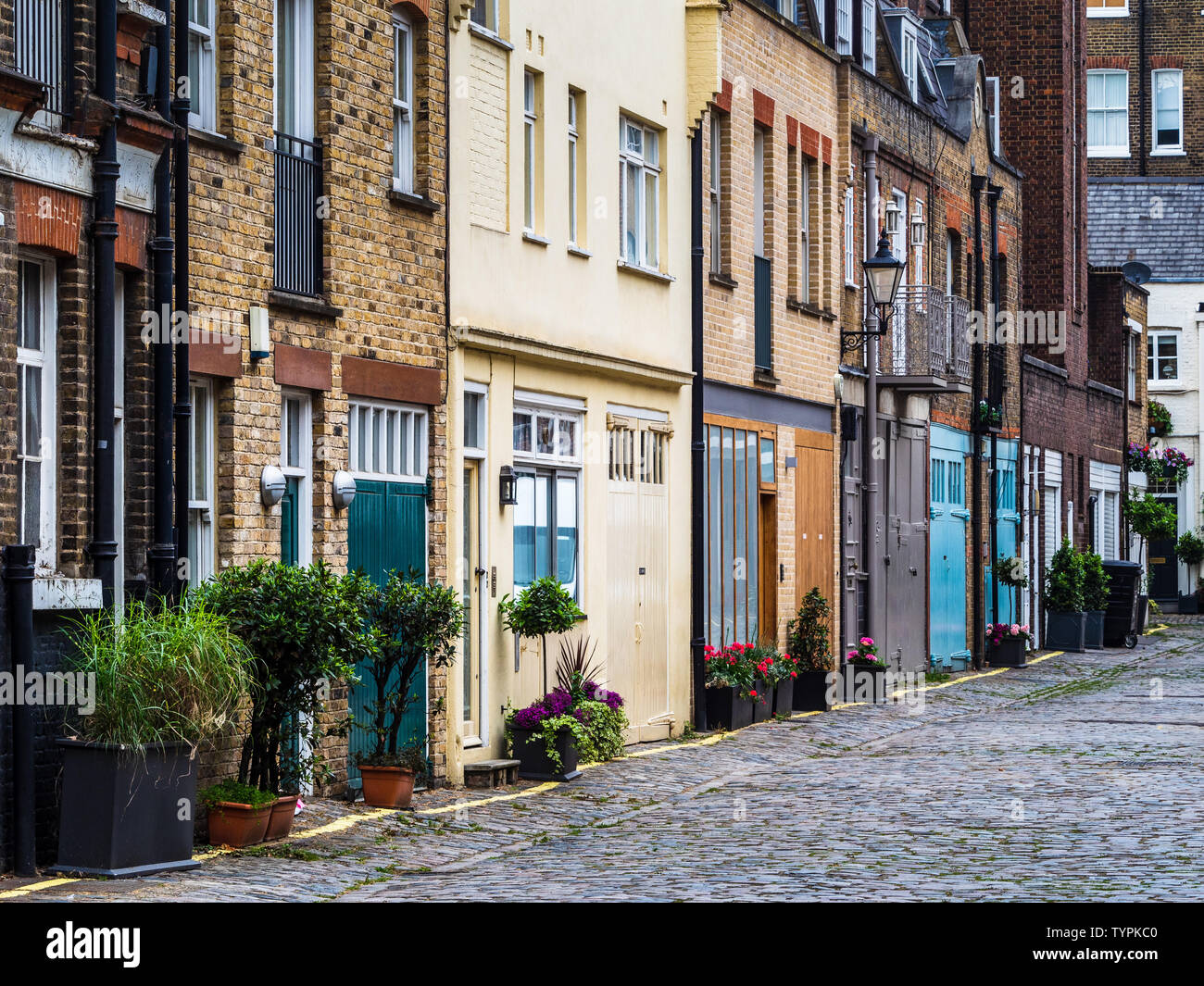 London Mews - Wigmore Ort ist ein typisches Londoner Mews Road off Wigmore Street, Westminster, London. Stockfoto