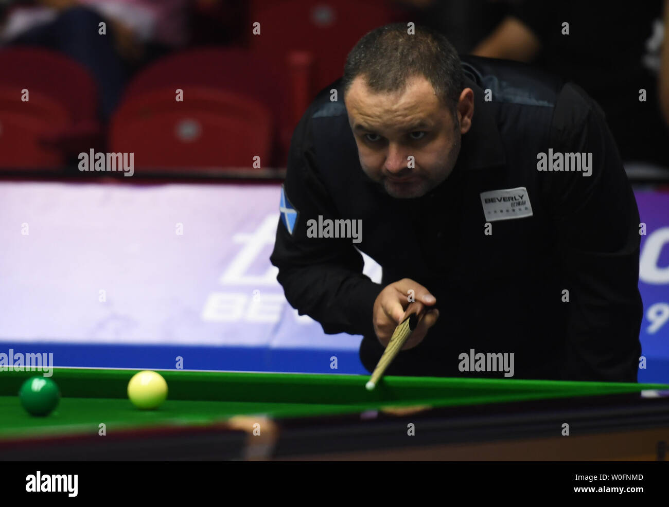 Wuxi in der chinesischen Provinz Jiangsu. 27 Juni, 2019. Stephen Maguire von Schottland konkurriert im Gruppenspiel zwischen Thor Chuan Leong/Moh scharf Ho von Malaysia und John Higgins/Stephen Maguire von Schottland an der 2019 Snooker Wm in Wuxi in der Provinz Jiangsu im Osten Chinas, 27. Juni 2019. Schottland gewann 4-1. Credit: Ji Chunpeng/Xinhua/Alamy leben Nachrichten Stockfoto