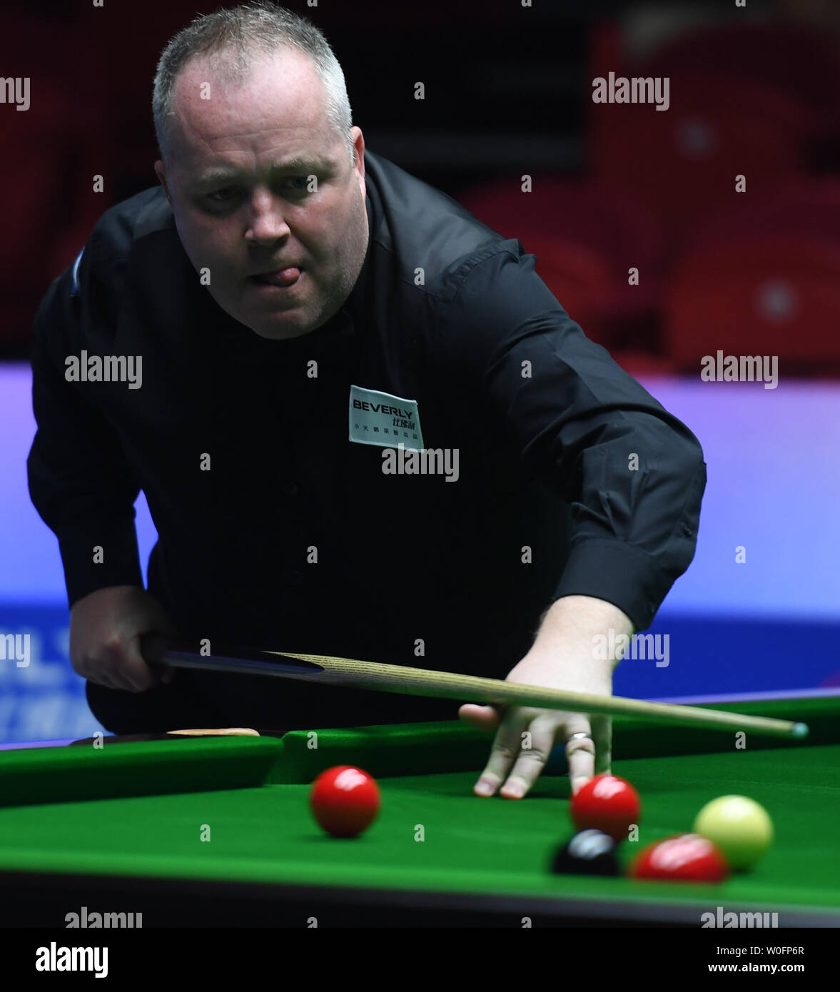 Wuxi in der chinesischen Provinz Jiangsu. 27 Juni, 2019. John Higgins von Schottland konkurriert im Gruppenspiel zwischen Thor Chuan Leong/Moh scharf Ho von Malaysia und John Higgins/Stephen Maguire von Schottland an der 2019 Snooker Wm in Wuxi in der Provinz Jiangsu im Osten Chinas, 27. Juni 2019. Schottland gewann 4-1. Credit: Ji Chunpeng/Xinhua/Alamy leben Nachrichten Stockfoto