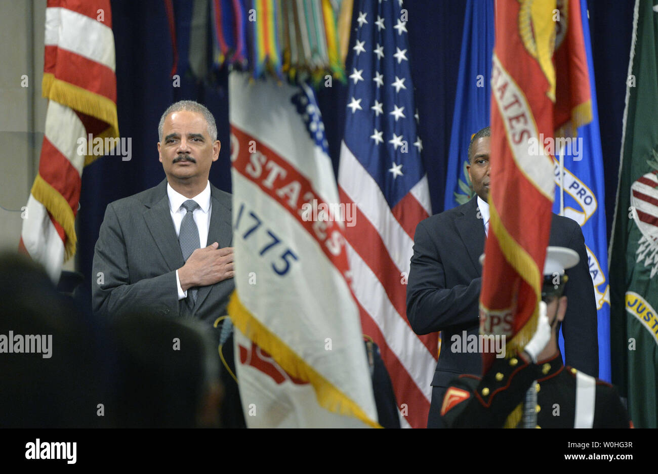 Us-Justizminister Eric Holder besucht eine Zeremonie horning zum 50. Jahrestag der Unterzeichnung des Civil Rights Act und die Bildung der bürgerlichen Rechte Abteilung des Ministeriums für Justiz, im Ministerium für Justiz in Washington, D.C. am 14. Juli 2014. UPI/Kevin Dietsch Stockfoto