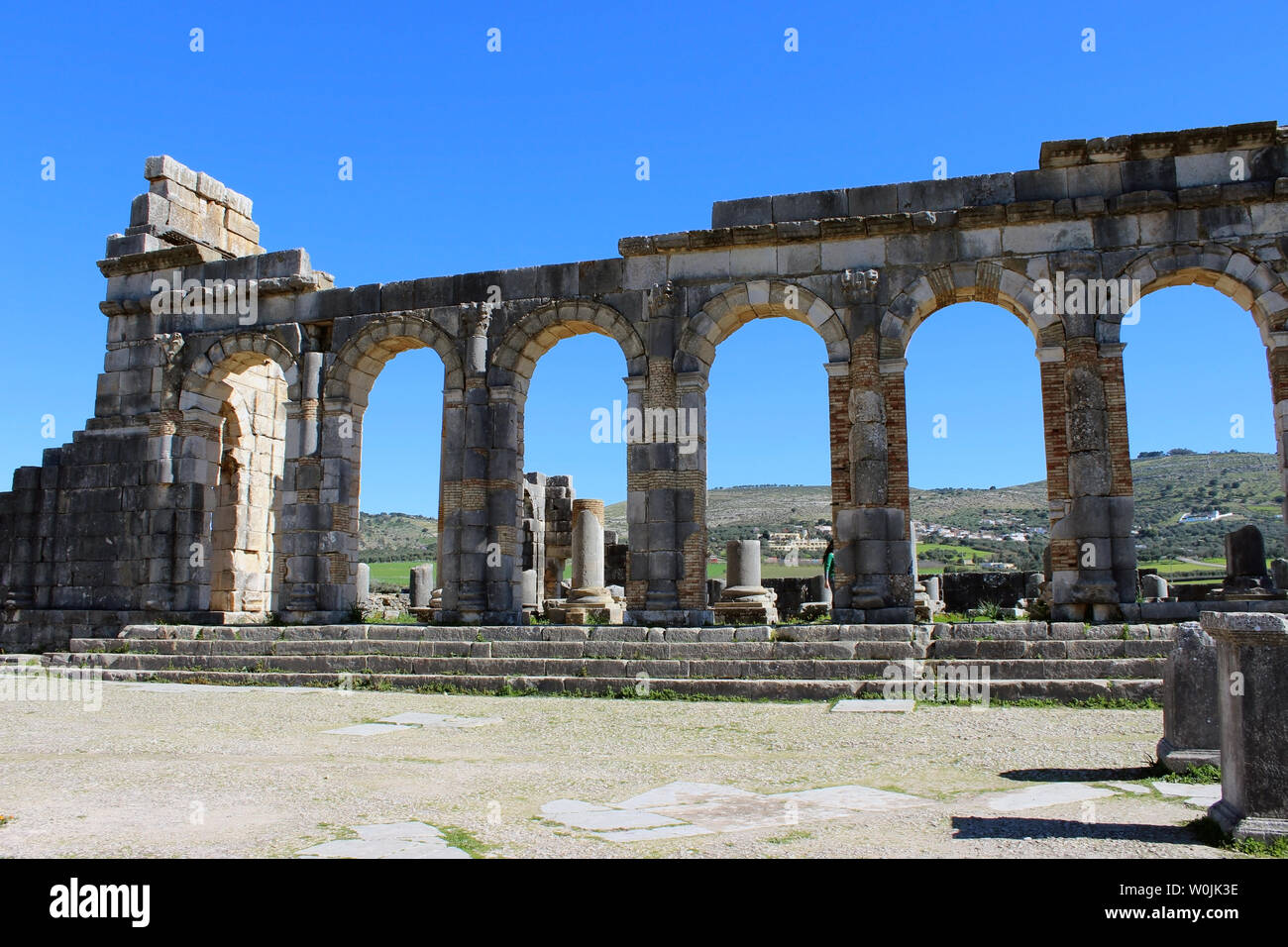 Volubilis war eine römische Stadt, die Ruinen, von denen derzeit teilweise sind eine archäologische Stätte, gelegen auf der Marokko ausgegraben. Stockfoto