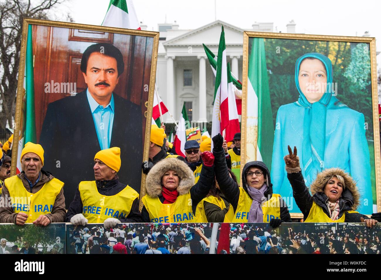 Demonstrationen halten sie Porträts von iranischen Politiker Massoud Rajavii und seine Frau Maryam Rajavi, wie sie bei einer Rallye durch die Organisation der iranisch-amerikanische Gemeinschaften für einen Regimewechsel im Iran teilnehmen, in Washington, D.C. am 8. März 2019. Die Gruppe ruft für ein iranisches Volk Aufstand für einen Regimewechsel in den herrschenden religiösen Partei bringen. Foto von Kevin Dietsch/UPI Stockfoto