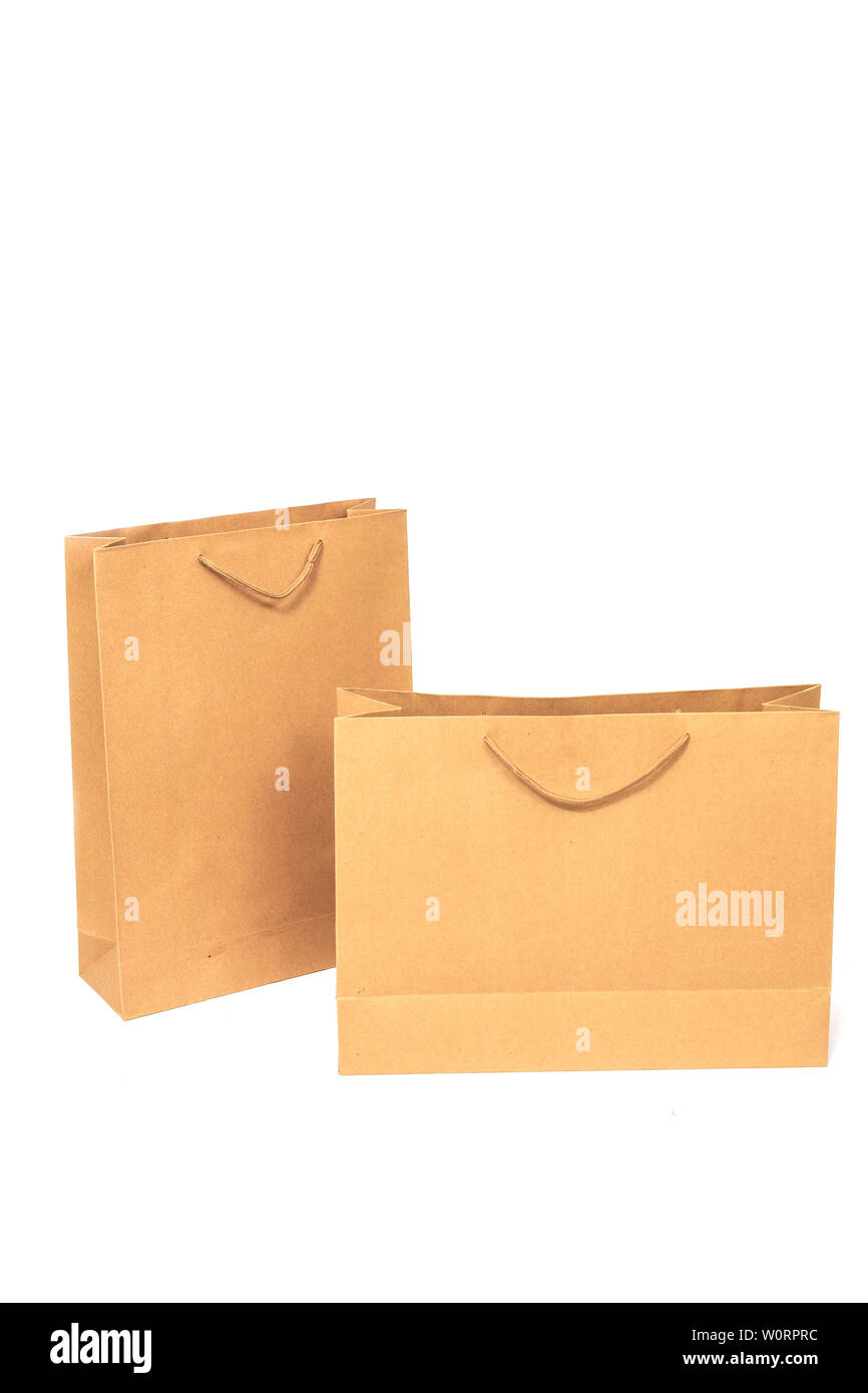 Einkaufstüten in weißem Hintergrund Stockfoto