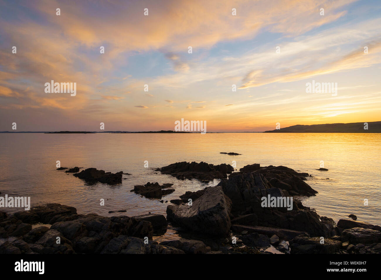 Sonnenuntergang über dem Murray Inseln von Carrick, Dumfries and Galloway, Schottland Stockfoto