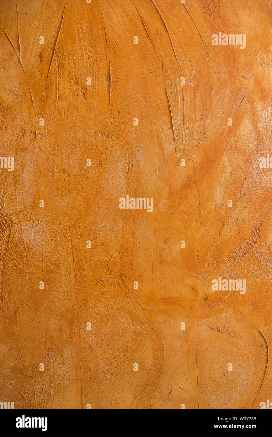 Hintergrund der warmen Orangetönen mit Relief Stockfoto