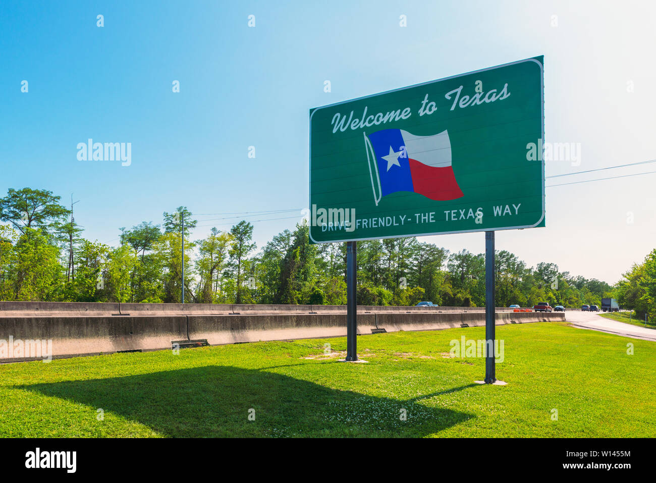 In der Nähe der Staatsgrenze mit Louisiana, Texas Zeichen in Orange, TX, USA Willkommen Stockfoto