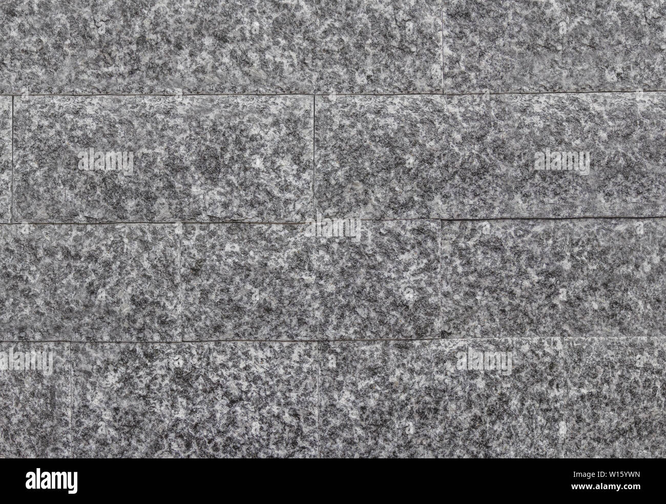 Die Textur von massivem Granitfliesen. Stockfoto