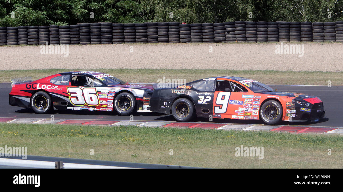 Die meisten, Tschechische Republik. 30. Juni 2019. Von links Ulysse DELSAUX (FRA/RDV Wettbewerb/FRA/Chevrolet Camaro), Gianmarco ERCOLI (ITA/Racers Motorsport/ITA/Ford Mustang). NASCARWhelenEuroSeries, NASCAR GP Tschechien, Runde 7, Elite 1,. Die meisten/Tschechien, Autodrom Most, Juni 30, 2019, Quelle: Wolfgang Fehrmann/ZUMA Draht/Alamy leben Nachrichten Stockfoto