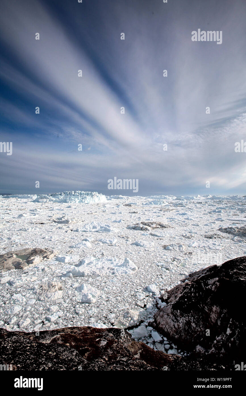 Schmelzendes Eis aus schnellste Gletscher der Welt, der jakobshavn Gletscher in der Nähe von Ilulissat auf Grönland. Die globale Erwärmung accellerated das Schmelzen und das Kalben der Eisberge. Stockfoto