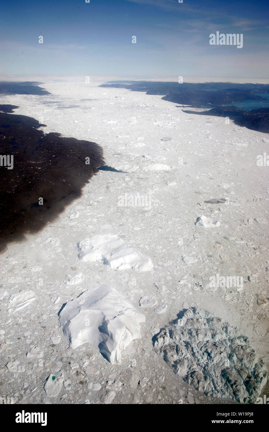 Schmelzendes Eis aus schnellste Gletscher der Welt, der jakobshavn Gletscher in der Nähe von Ilulissat auf Grönland. Die globale Erwärmung accellerated das Schmelzen und das Kalben der Eisberge. Stockfoto