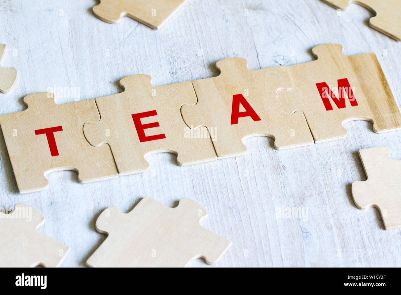 Team Wort Hintergrund Geschäftskonzept auf Puzzle Stockfoto