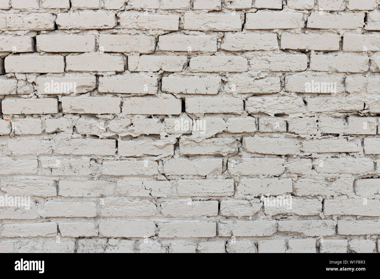 Graue wand Brick Textur kiesige Breite Stockfoto