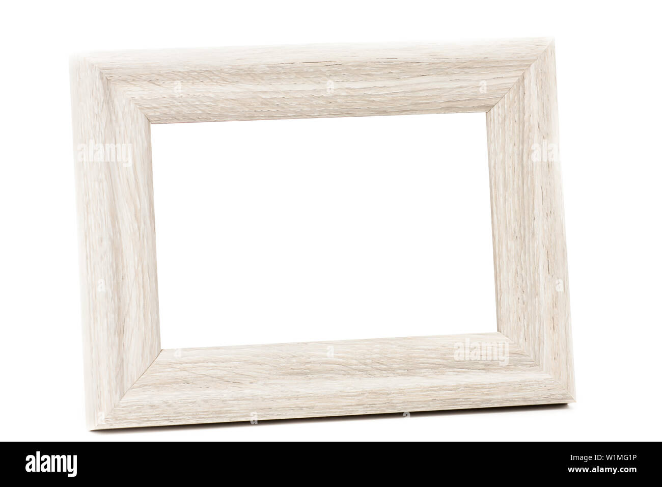 Eine hölzerne vintage Bilderrahmen hat einen weißen Hintergrund Stockfoto