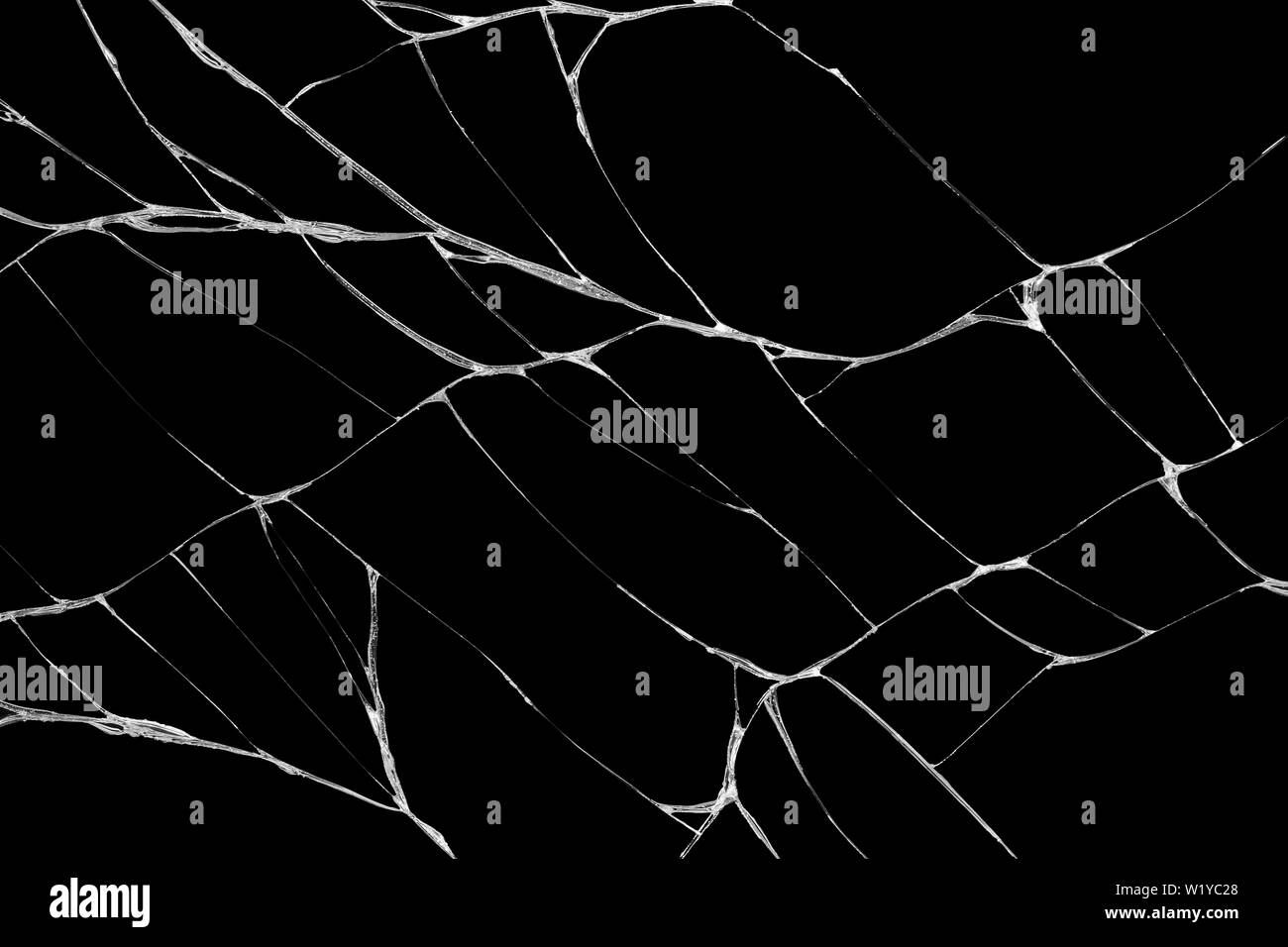 Close-up Kunst der Muster der Knicke und Risse auf dem Touchscreen Display des Smartphones durch fallende auf schwarzem Hintergrund verursacht Stockfoto