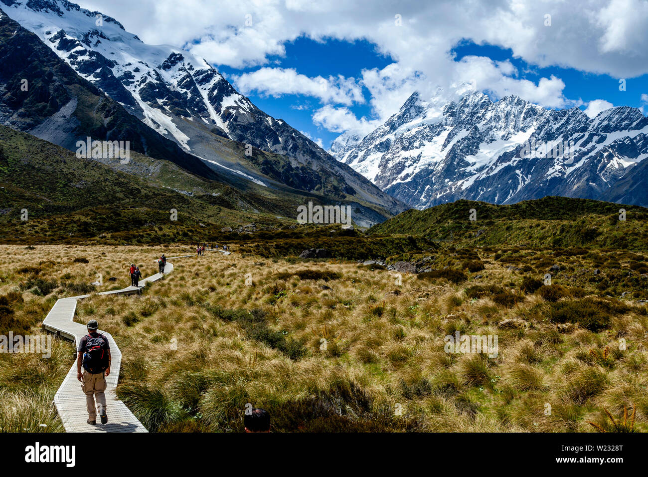 Wanderer auf dem Hooker Valley Track, Aoraki/Mt Cook National Park, South Island, Neuseeland Stockfoto