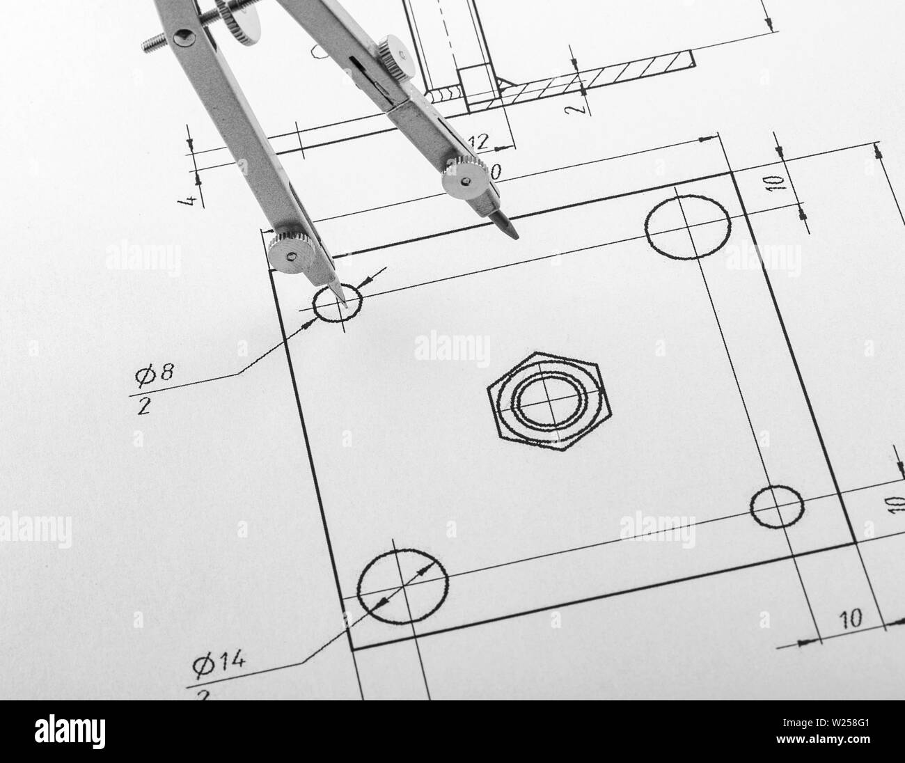 Kompasse in den Zeichnungen. Design- und Ausführungszeichnungen mit dem Zirkel. selektive Fokus Stockfoto