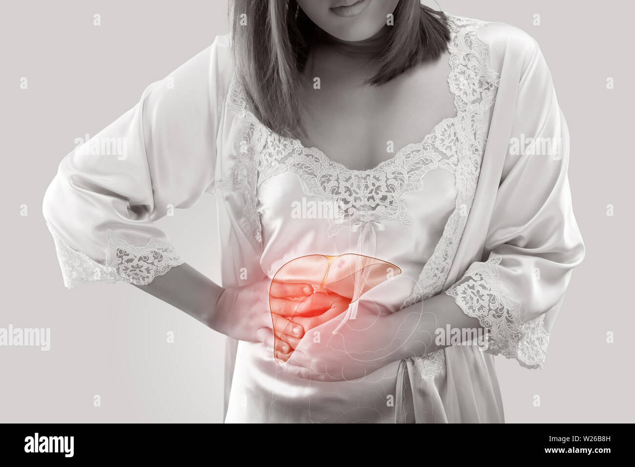 Das Foto von der Leber auf der Frau Körper gegen grauen Hintergrund, Hepatitis, Konzept mit Gesundheitswesen und Medizin Stockfoto