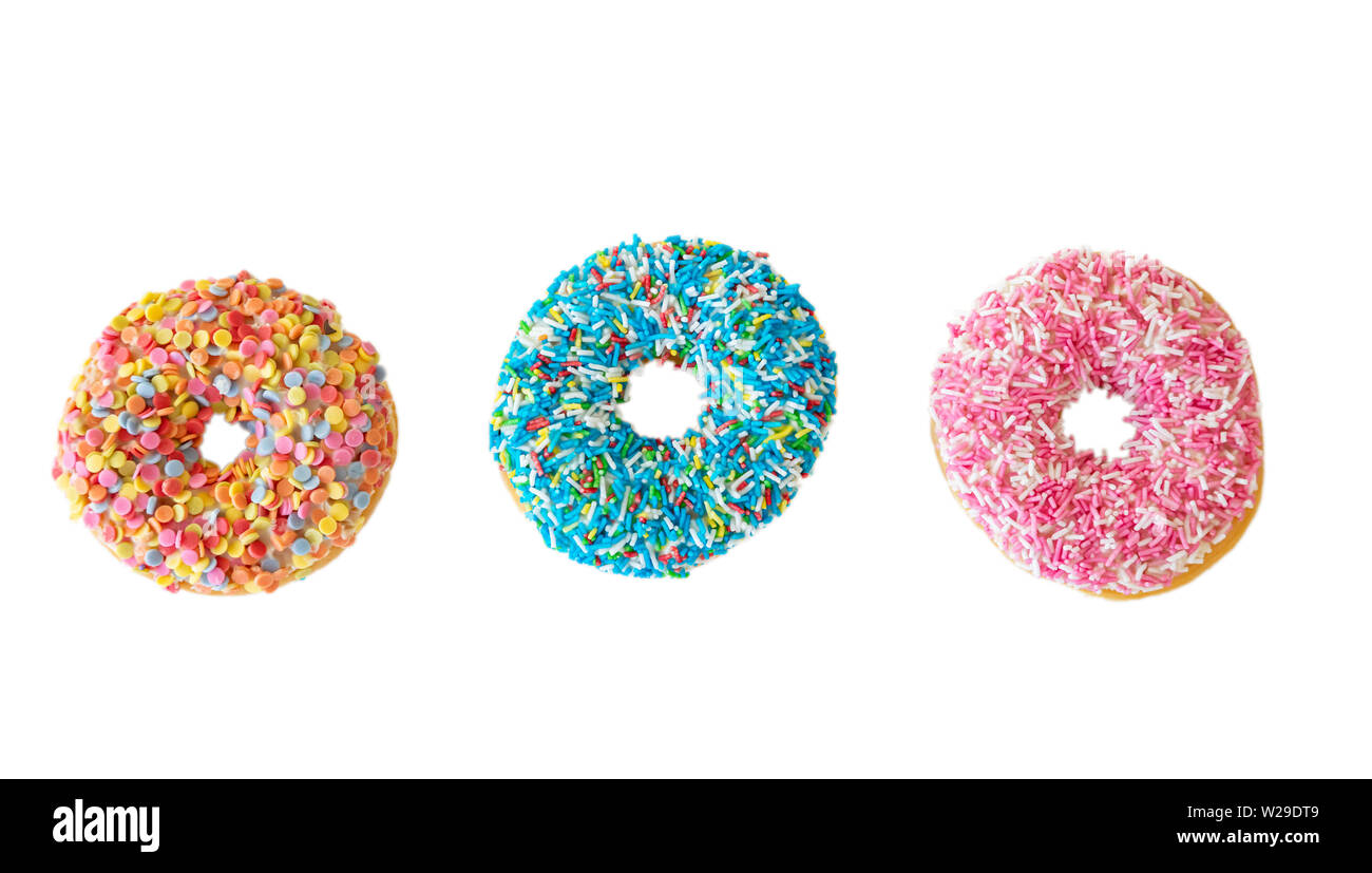 Sortierte Donuts. Bunte donuts Sortiment auf weißen Hintergrund. Ansicht von oben Stockfoto