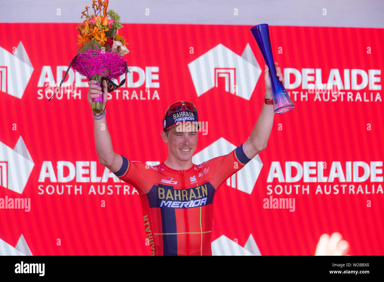 ADELAIDE, Australien - Januar 20. Rohan Dennis von Australien und Bahrain-Merida Pro Cycling Team feiert nach Stufe 6. Stockfoto