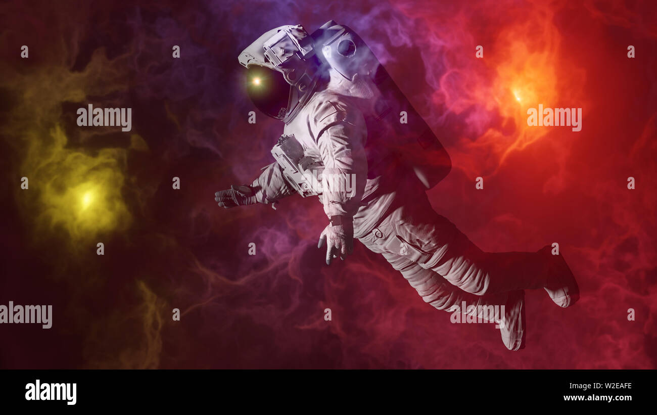 Astronaut, der bunte Nebel (3d-Abbildung) Stockfoto