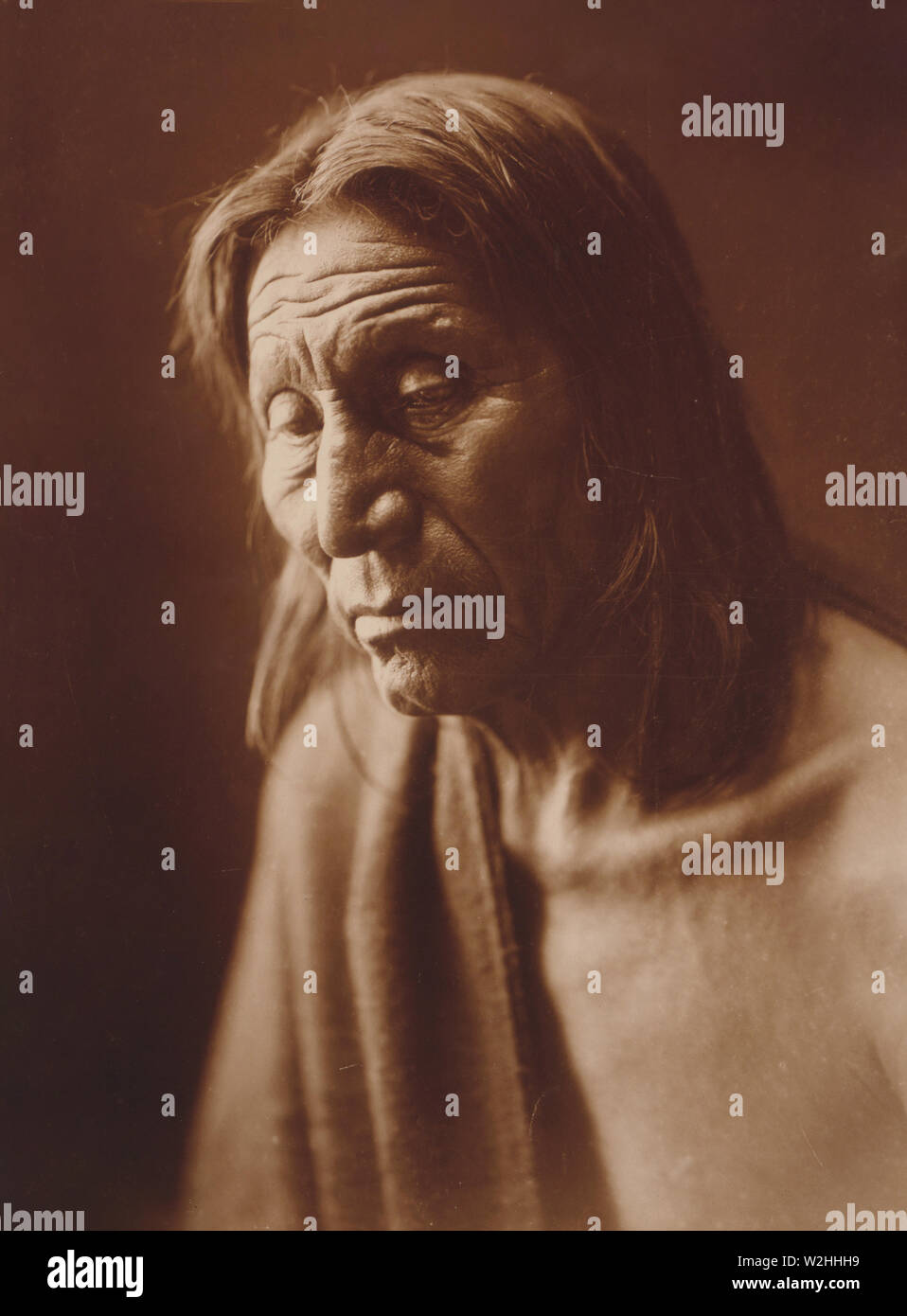 Edward S. Curtis Native American Indians - Big Head, Kopf und Schultern portrait Ca. 1905 Stockfoto