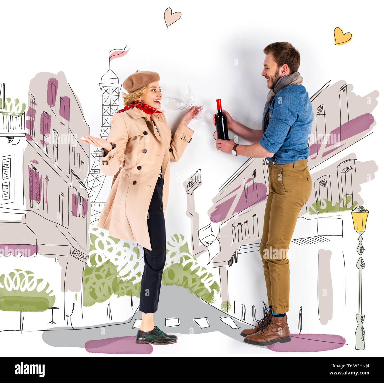 Happy Elegant Paar hält Wein Flasche und Gläser mit Paris Abbildung auf Hintergrund Stockfoto
