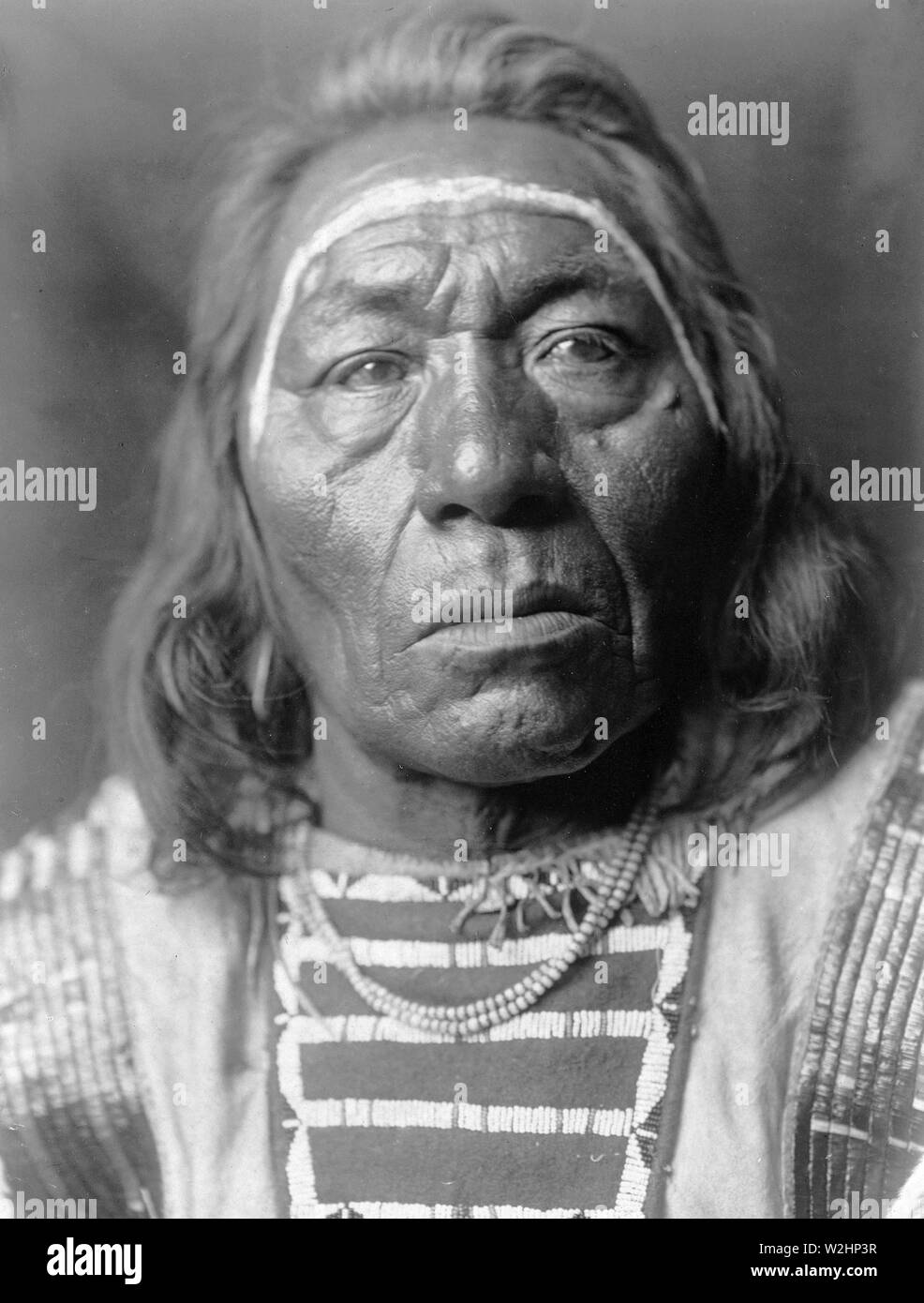 Edward S. Curtis Native American Indians - Crow Indian, führt der Wolf Ca. 1908 Stockfoto