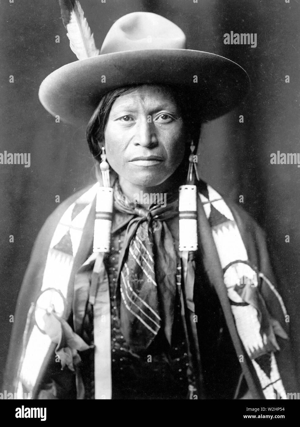 Edward S. Curtis Native American Indians - jicarilla Apache Indian Cowboy Hut tragen kann. 1905 Stockfoto