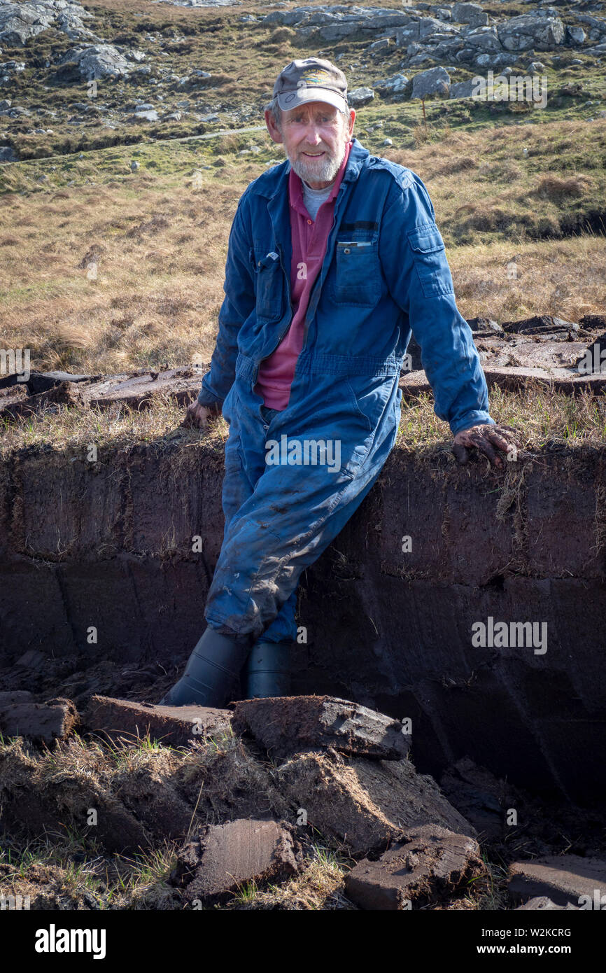 Torfstich Mann, Harris, Schottland, UK Stockfoto
