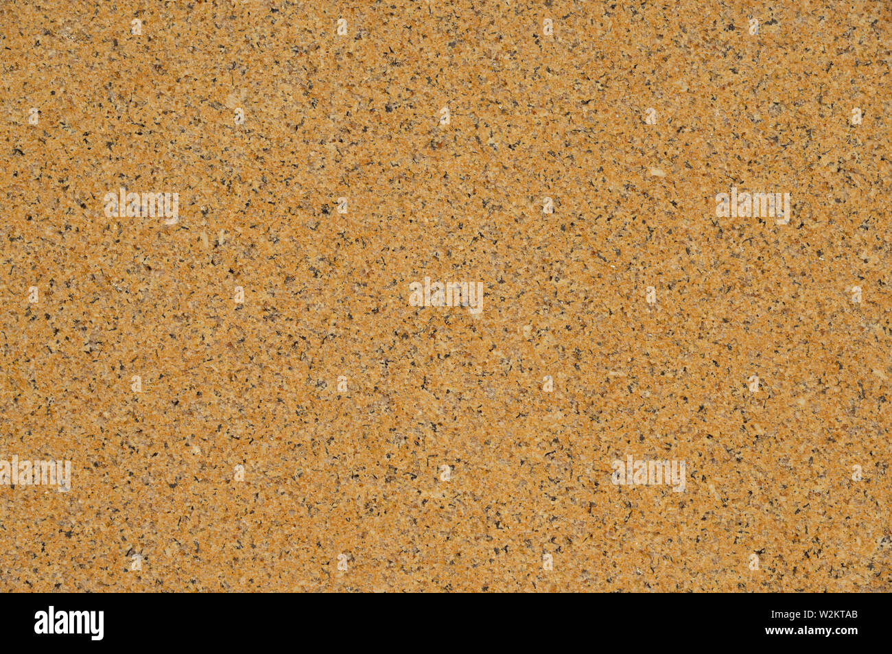 Gelb Granit Wand mit Qt und glatte Oberfläche als Hintergrund Stockfoto