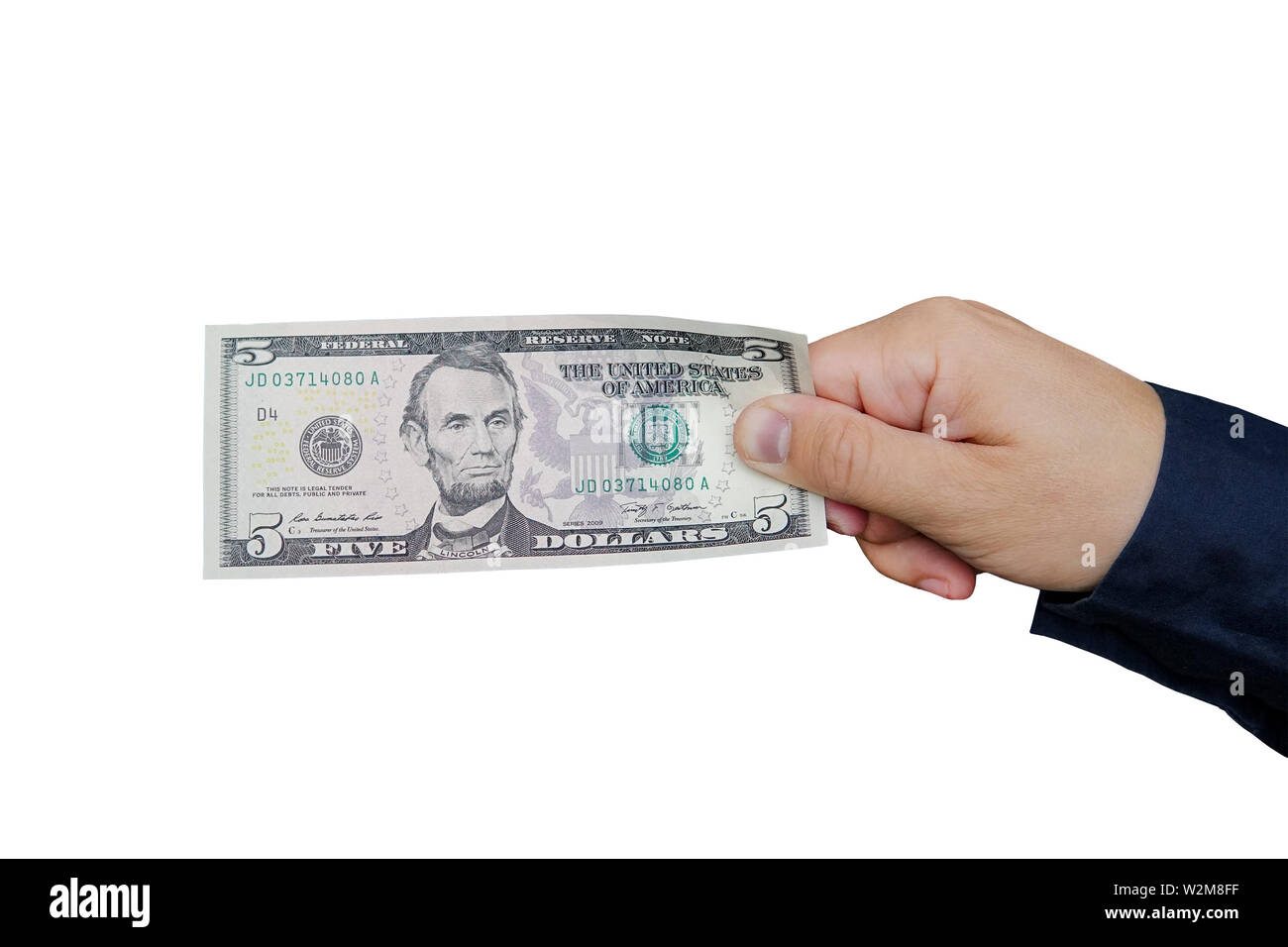 Hand mit fünf Dollar Bill, auf weißem Hintergrund. Stockfoto