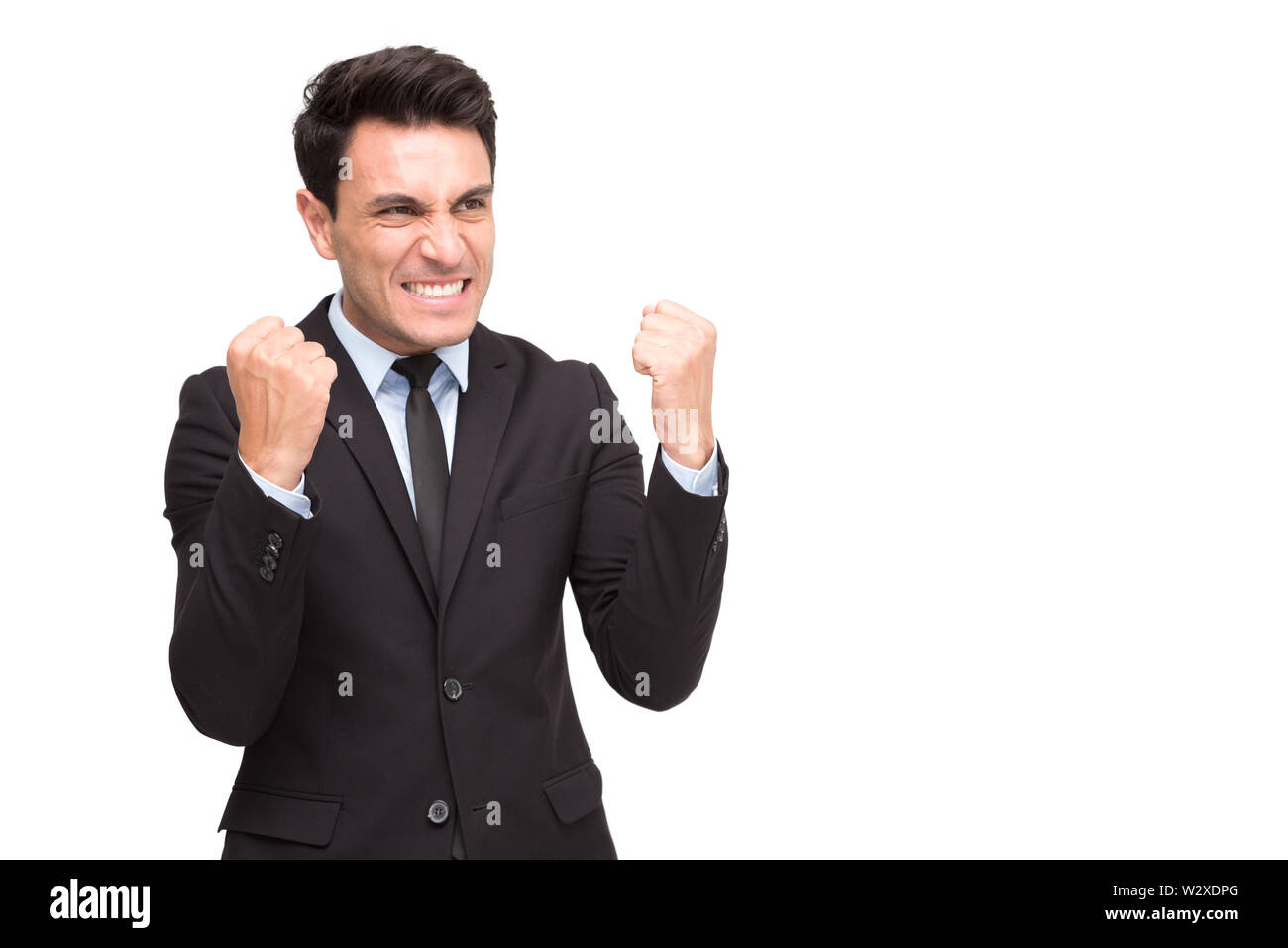 Aufgeregt executive Geschäftsmann in Anzug Gefühl Sieger feiern Sieg Geschäftserfolg auf weißem Hintergrund Stockfoto
